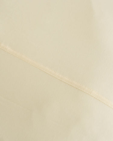 Mylk fitted sheet by The T-Shirt Bed Co., jersey-knit cotton that resists creasing