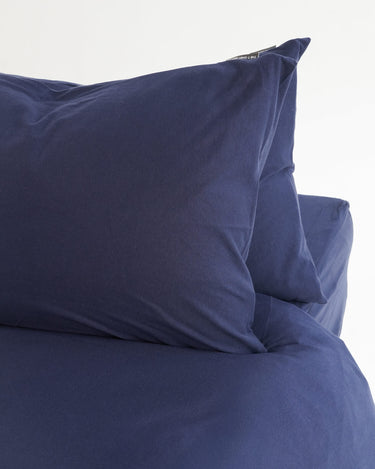 Navy duvet cover set by The T‑Shirt Bed Co., deep blue jersey cotton, non-iron and breathable