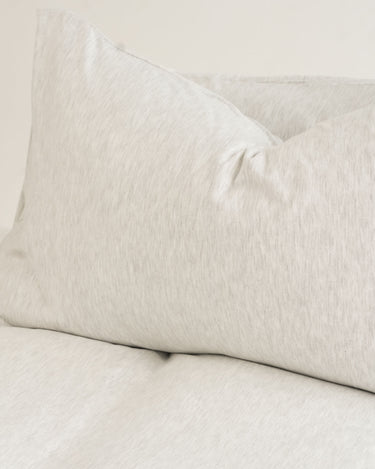 Pebble duvet cover set by The T‑Shirt Bed Co., cool grey cotton knit with soft, non-iron finish
