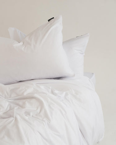 Scandinavian White duvet bedding by The T‑Shirt Bed Co., deep softness and non‑crease finish