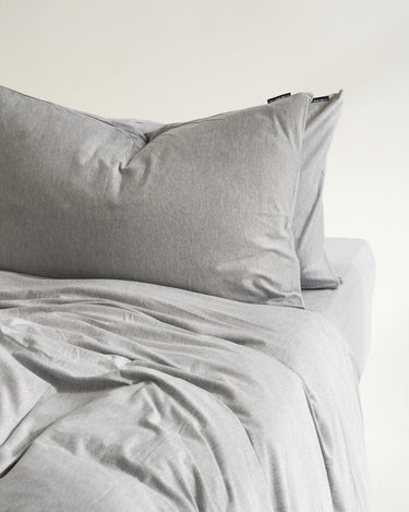 Soft Grey duvet cover set by The T‑Shirt Bed Co., jersey-knit cotton that’s crease-free and breathable