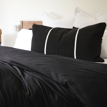 Raven black duvet cover set by The T‑Shirt Bed Co., luxe cotton knit that’s soft and crease-free