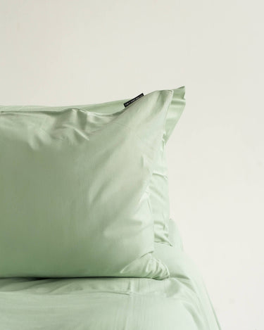Fauna duvet set in pastel mint green, silky jersey cotton that’s non-iron and allergy-friendly
