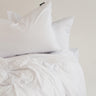 Scandinavian White duvet bedding by The T‑Shirt Bed Co., deep softness and non‑crease finish
