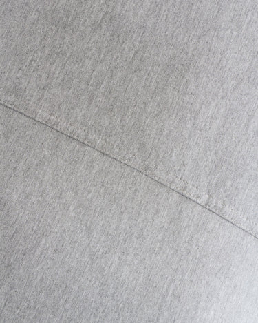 Fitted sheet in Soft Grey jersey-knit cotton from The T-Shirt Bed Co., crease-free and breathable