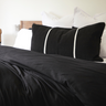 Raven black duvet cover set by The T‑Shirt Bed Co., luxe cotton knit that’s soft and crease-free